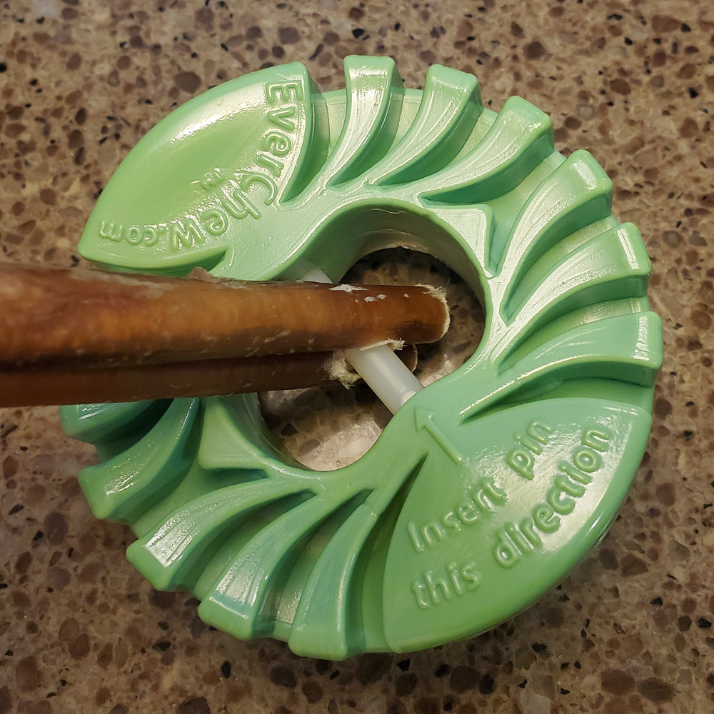 SafetyChew+ bully stick dog chew holder with a locked in stick