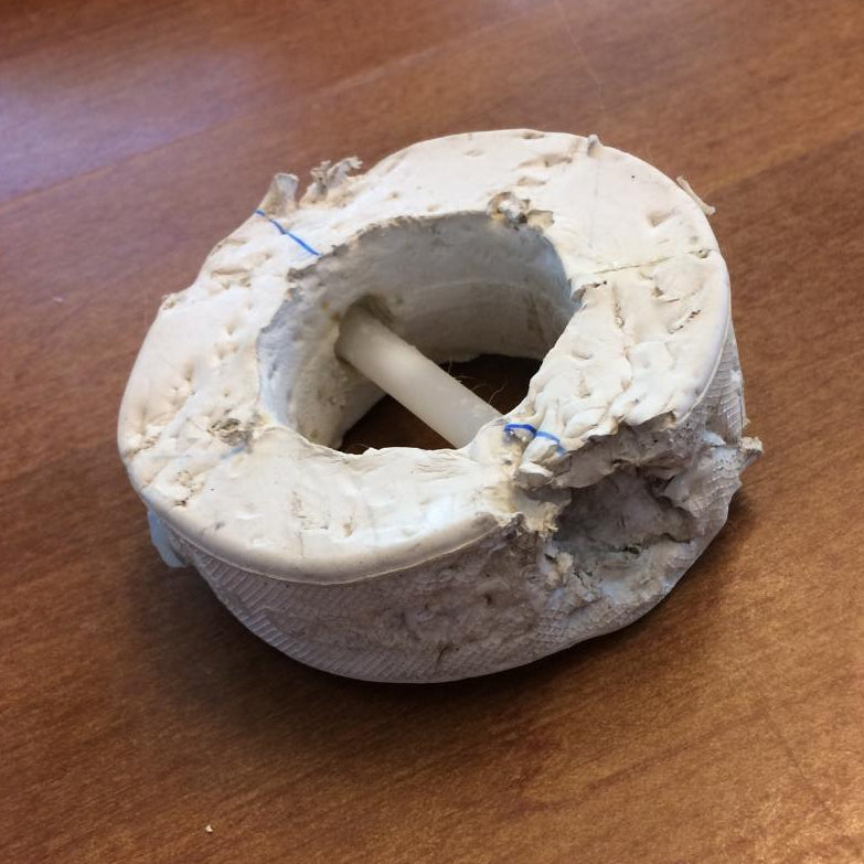 prototype made from a hockey puck