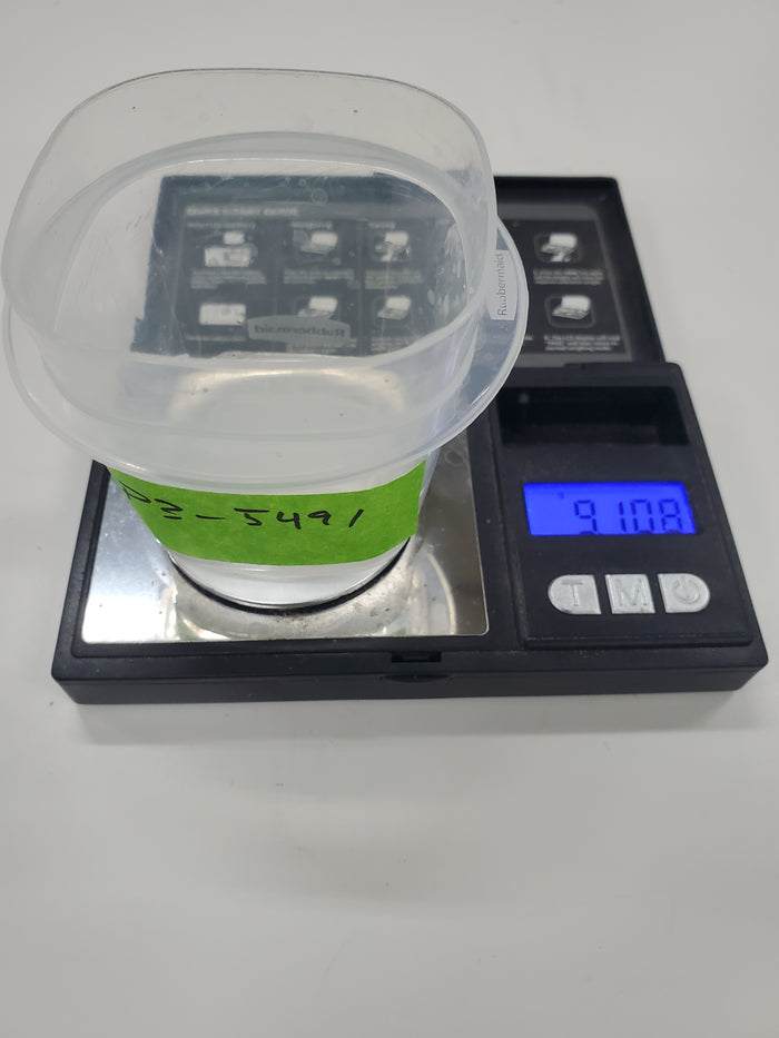 Enrichment broth being added to the first dog chew sample vial