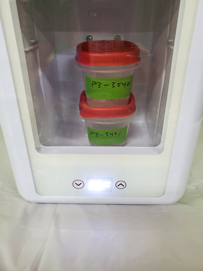 Dog chew sample vials undergoing incubation at 37 degrees Celsius