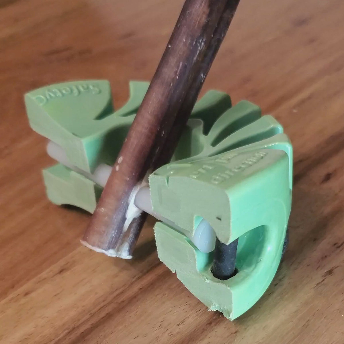 clip showing how the pin locks in the dog chew
